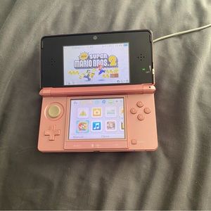 Nintendo 3DS pink with 7 games